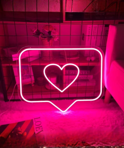 Neon-Schild mit „Likes“