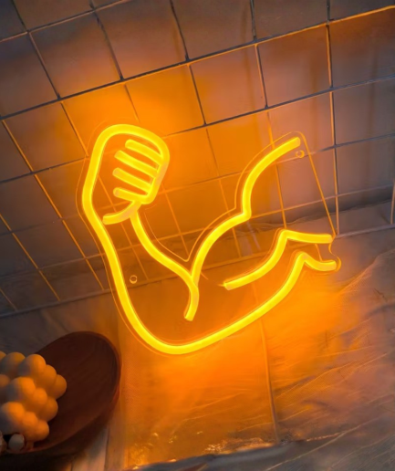 Neonlampe mit Muskelmotiven