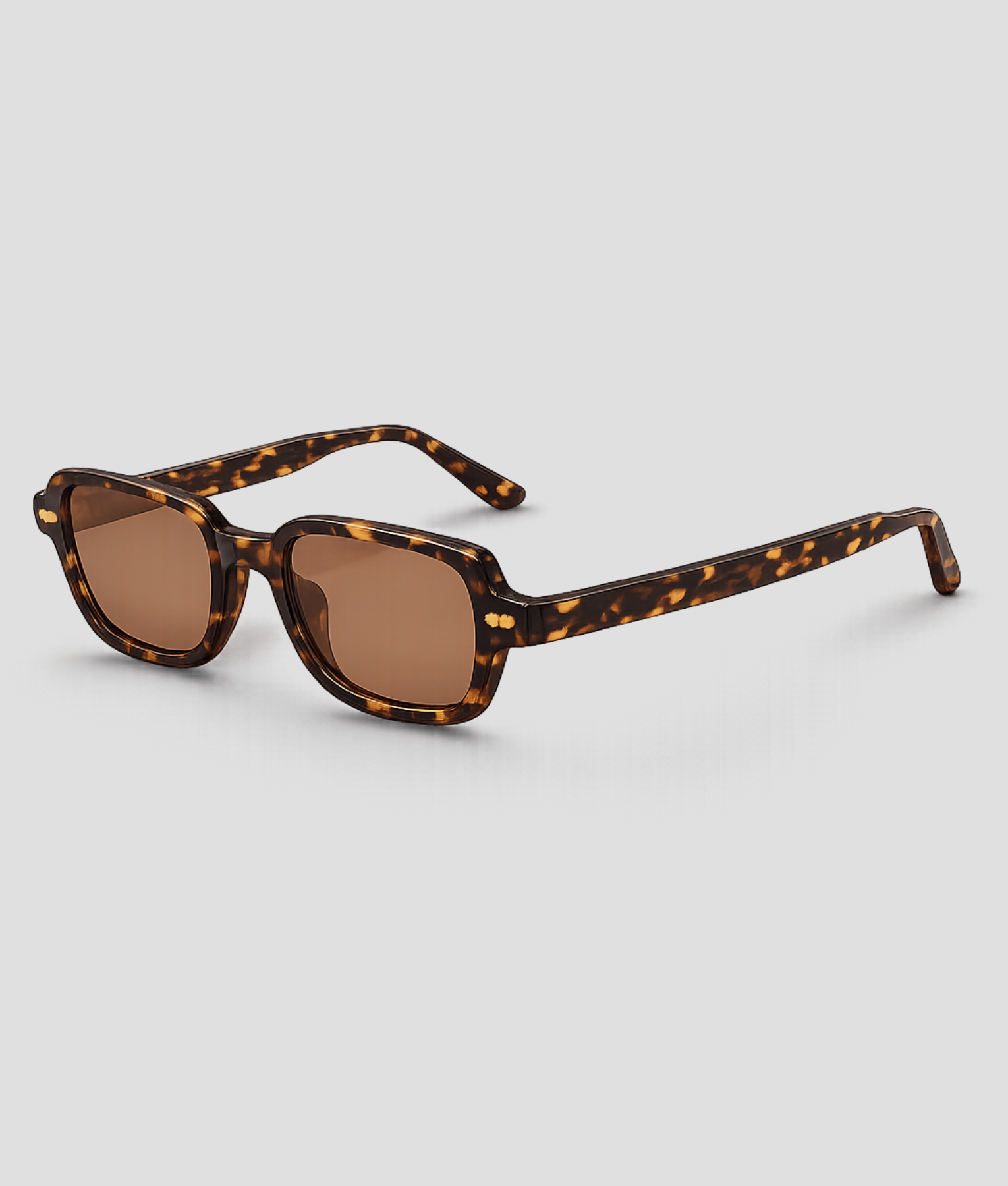 Schildpad print zonnebril met tortoiseshell montuur in bruine en zwarte tinten bruine lenzen en goudkleurige details